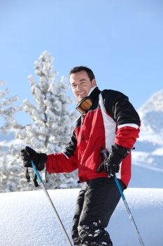 Smiling male skier