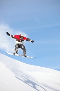 Snowboarder performing impressive jump