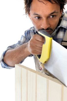 Man sawing wood