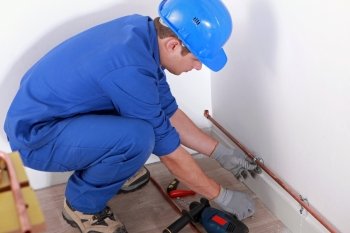 Plumber fitting pipes