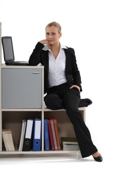 beautiful businesswoman relaxing at her office