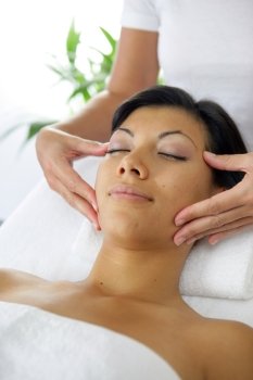 Woman getting a face massage