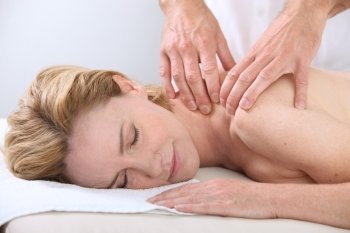 Woman enjoying back massage