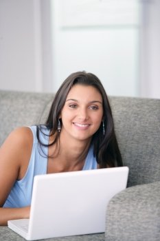 Beautiful woman using her laptop