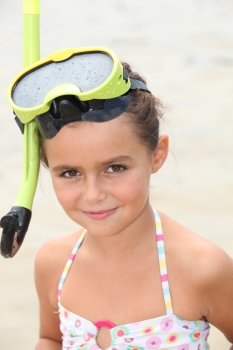 Little girl wearing snorkel