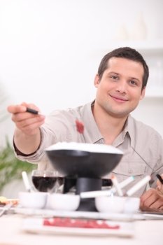 Man with fondue