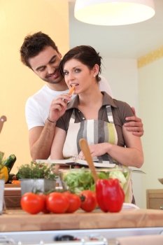 Young couple in their kitchen