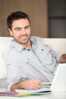 Man working from living room