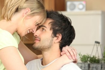 Young woman staring at her boyfriend tenderly