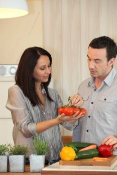 Couple debating which vegetables to cook