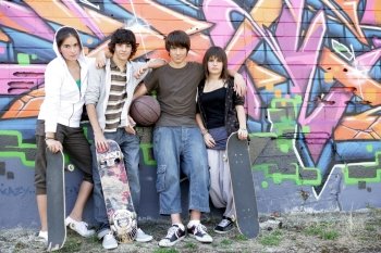 teenagers riding skateboard
