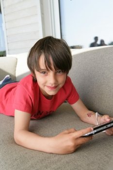 little boy playing video games
