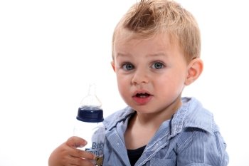 Boy holding bottle