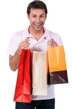 Man delighted with his shopping purchases