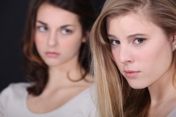 Two young women post-argument