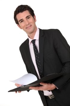 Business man holding a clipboard