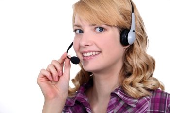 Woman speaking into a headset
