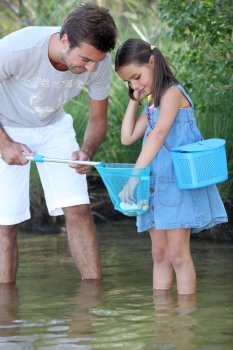 father and his little girl fishing