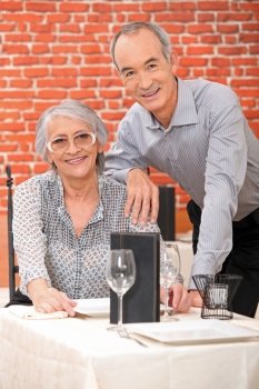 Elderly couple in restaurant