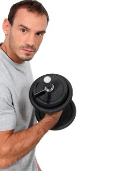 man training with a dumbbell