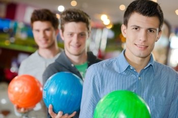 men with bowling ball