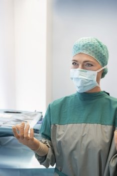 Female surgeon in scrubs at hospital