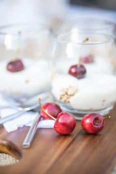 Fresh cherries and vanilla yoghurt breakfast