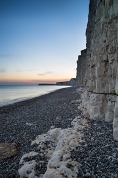 Beautiful landscape image of sunset over Birling Gap in England