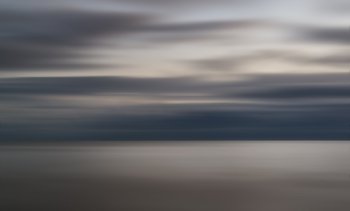 Conceptual landscape image of movement in the ocean during sunset