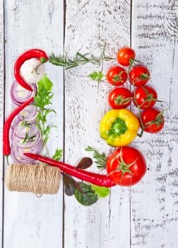 Border of healthy Bio Vegetables on a Wooden Background