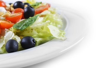salad of vegetables with cheese and  seeds  on  plate
