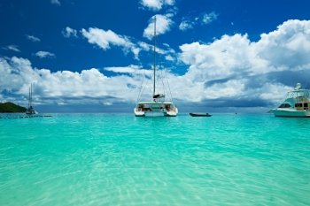 Beautiful beach with boats at Seychelles, Praslin, Anse Lazio
