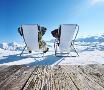 Couple at mountains in winter, Val-d’Isere, Alps, France