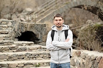 Man with backpack traveling in Armenia