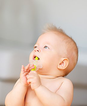 Baby boy with toothbrush portrait