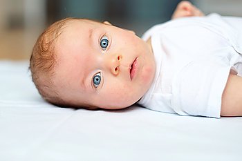 Four months old baby with blue eyes