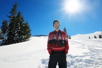 photographer portrait at beautiful winter day with fresh snow