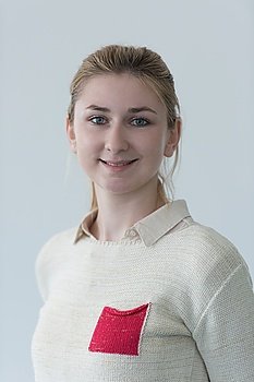 portrait of happy smilling female student girl in school library