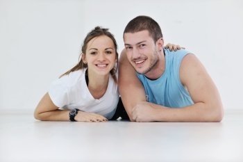 happy young couple fitness workout and fun at sport gym club