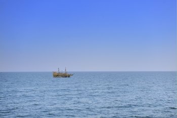 tourist pirate boat ship sail on sea ocean