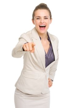 Happy business woman pointing in camera