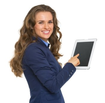 Portrait of smiling business woman using tablet pc