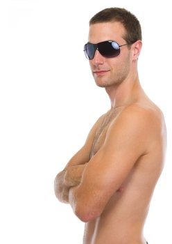 Portrait of on vacation young man in sunglasses