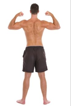 Strong man sports man showing muscular back