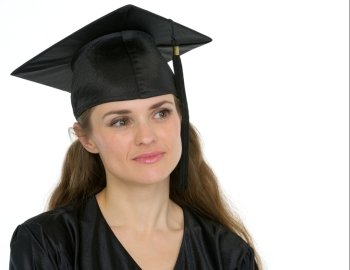 Portrait of thoughtful graduation woman looking on copy space