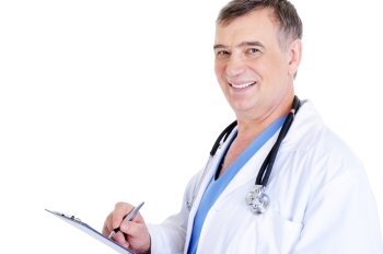 successful laughing mature male doctor writing something