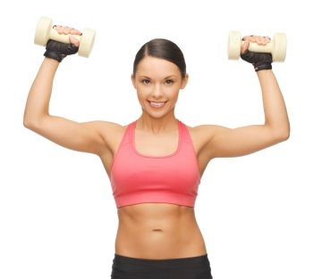 picture of beautiful sporty woman with dumbbells