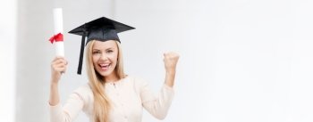 education concept - happy student in graduation cap with certificate. student in graduation cap with certificate
