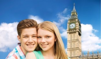 travel, vacation, technology and friendship concept - happy couple over big ben tower in london city background
