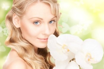 picture of beautiful woman with orchid flower and butterflies